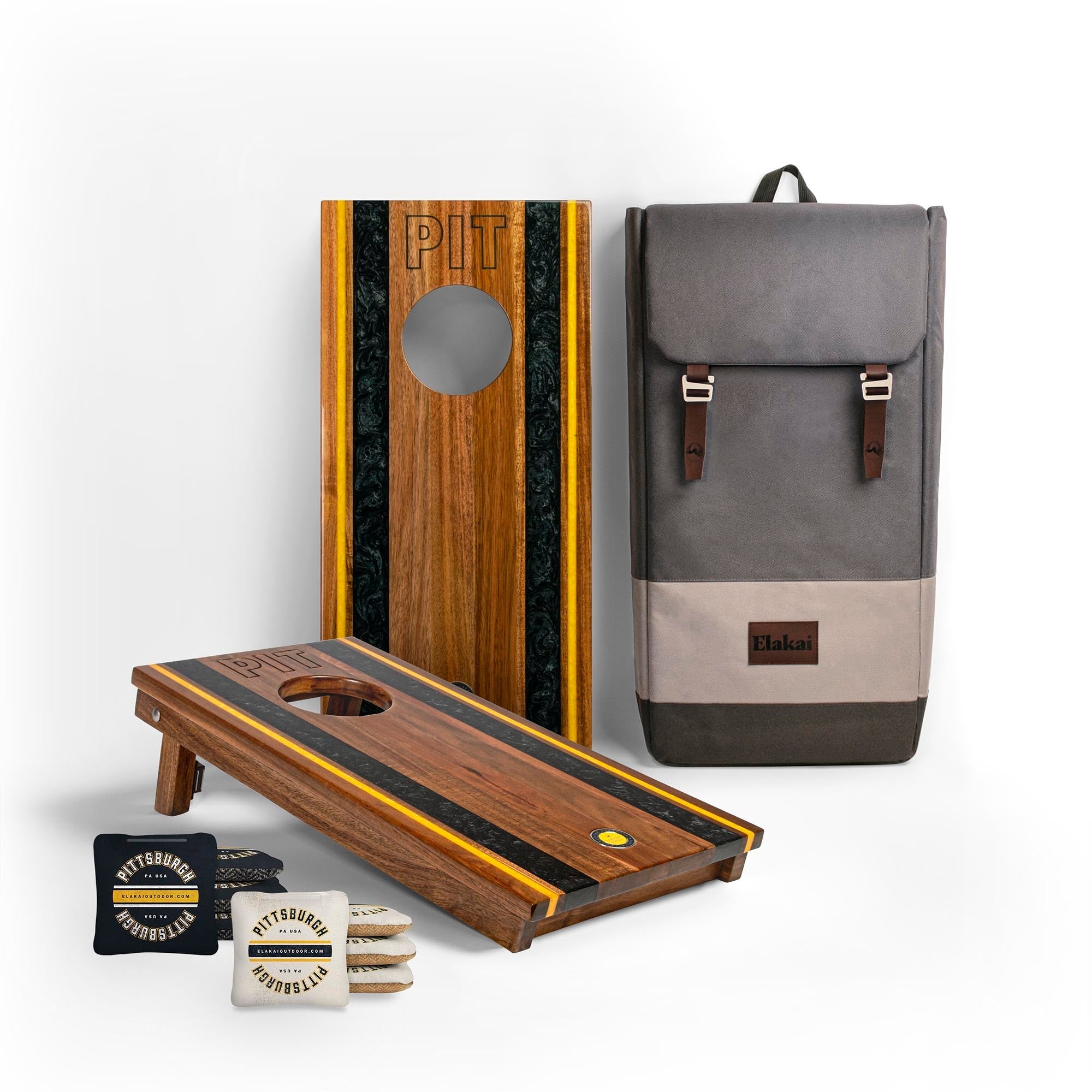 Cornhole boards with bags and a backpack on a white background
#color_pittsburgh