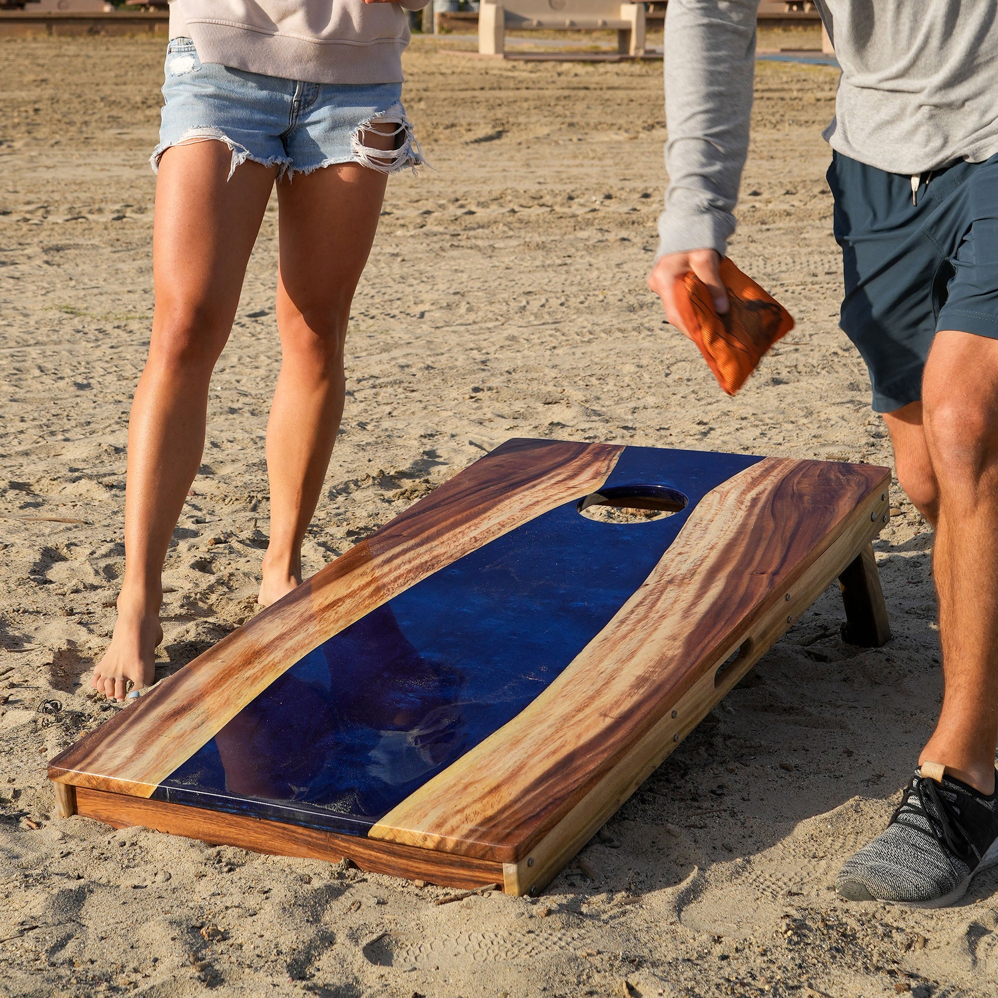 The River Epoxy Resin with Live Edge Acacia Pathfinder ART Cornhole Boards