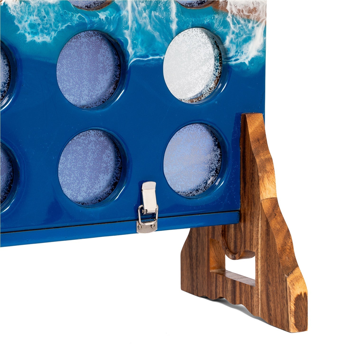 Corner close-up of the giant four in a row board highlighting the ocean wave epoxy resin and stainless folding latch